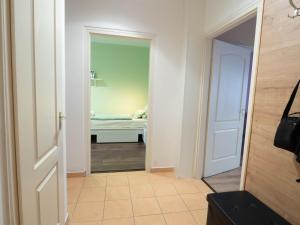 Kúpeľňa v ubytovaní Pajger Apartman Egyetemváros