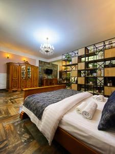Postel nebo postele na pokoji v ubytování Shirbakyan Boutique Hotel & Apartments