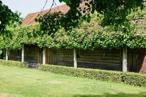 Ein Garten an der Unterkunft B&B De Hulst