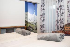 Posteľ alebo postele v izbe v ubytovaní Gästehaus Fuchs