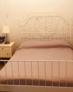 Postel nebo postele na pokoji v ubytování Galaria House