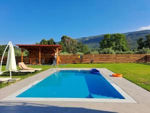 The swimming pool at or close to OLYMPUS Paradise 6