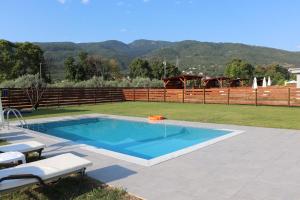 The swimming pool at or close to OLYMPUS Paradise 6
