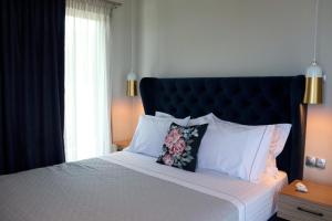 A bed or beds in a room at OLYMPUS Paradise 6 Még 32 kép