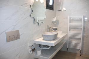 A bathroom at OLYMPUS Paradise 6