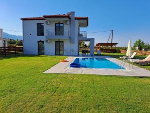 The swimming pool at or close to OLYMPUS Paradise 6