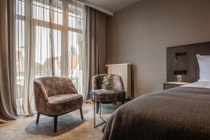 Postel nebo postele na pokoji v ubytování Hotel Britannia + 37 fotografií