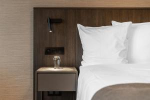 Postel nebo postele na pokoji v ubytování Hotel Britannia
