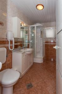 Kylpyhuone majoituspaikassa Apartment resort