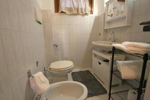 Koupelna v ubytování Bellagio Apartment San Giovanni + 22 fotografií