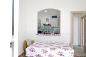 Posteľ alebo postele v izbe v ubytovaní Sole Mare - Casa Vacanze Chiavarello