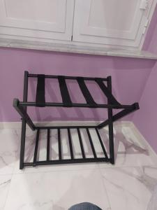 Rúm í herbergi á B&B Dint 'o core e Napule
