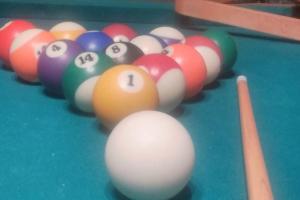 a group of billiard balls on a pool table at Adirondack Valley House - Close to Saratoga Track in Saratoga Springs