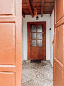 an entrance to a room with a wooden door at Casa La Encarnación in Santa Cruz de la Palma