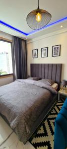 Postel nebo postele na pokoji v ubytování Luxueux Appartement DOWNTOWN RABAT