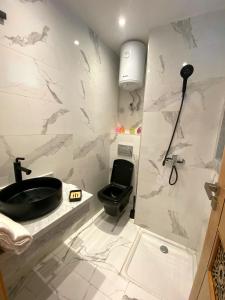 Ванна кімната в Luxueux Appartement DOWNTOWN RABAT