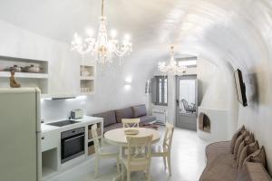 A kitchen or kitchenette at Sun Naam Home Santorini with heated jacuzzi