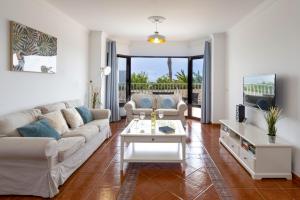 A television and/or entertainment centre at Villa Maria by Villa Plus