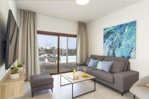 A seating area at Villa Muzu by Villa Plus