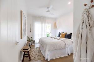 Postel nebo postele na pokoji v ubytování Clearwater Noosa Resort