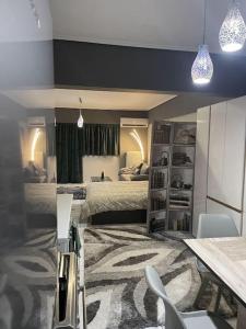 Cama ou camas em um quarto em Central Modern Apartment Volos