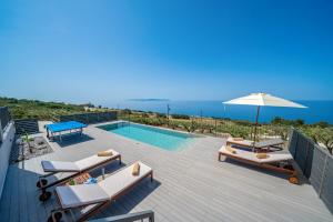 The swimming pool at or close to Villa Katoikia Mia by Villa Plus