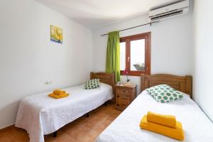 Postel nebo postele na pokoji v ubytování Villa Pepe by Villa Plus