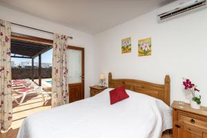 Postel nebo postele na pokoji v ubytování Villa Pepe by Villa Plus