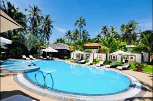 美奈的住宿－Jaguar House Resort Muine，度假酒店的游泳池