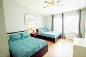 Ένα ή περισσότερα κρεβάτια σε δωμάτιο στο Meadow View on Kennewick Ct - Dog Friendly