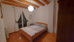 Postel nebo postele na pokoji v ubytování Idealna kuća za odmor, Pale