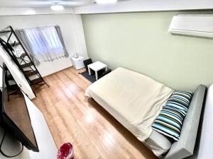Letto o letti in una camera di 難波無印ノ家