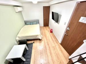 TV o dispositivi per l'intrattenimento presso 難波無印ノ家