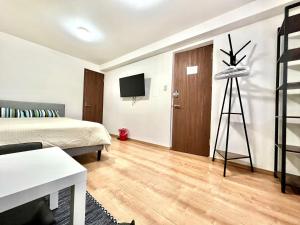 Letto o letti in una camera di 難波無印ノ家