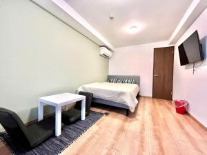 Letto o letti in una camera di 難波無印ノ家
