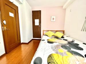 Letto o letti in una camera di 難波無印ノ家