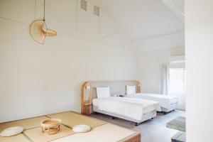 Cama ou camas em um quarto em Chu Resort Hualien