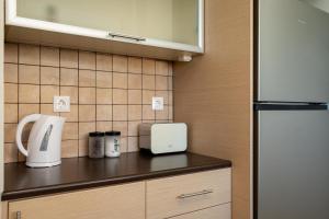 Kuchyňa alebo kuchynka v ubytovaní Blanco Apartment by A&D Properties