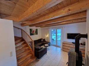 A television and/or entertainment centre at Chalet in Kötschach by Ski Slopes