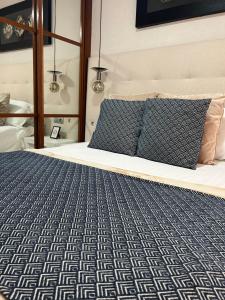 Łóżko lub łóżka w pokoju w obiekcie Apartamento Nemingzhen Tarifa