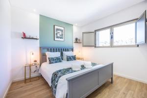 Postel nebo postele na pokoji v ubytování The Kuuyi Suite + 18 fotografií