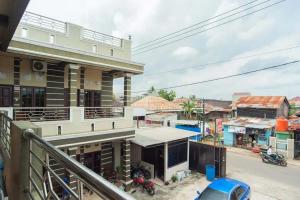 a view from a balcony of a building at RedDoorz at KM 5 Palembang in Palembang
