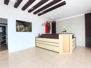 a lobby with a reception desk in a building at DZ Hotel Salor in Kota Bharu