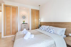Łóżko lub łóżka w pokoju w obiekcie El Oasis Martinica 8 1A
