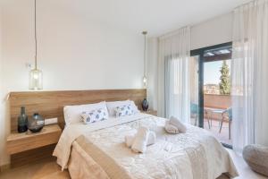 Łóżko lub łóżka w pokoju w obiekcie El Oasis Martinica 8 1A