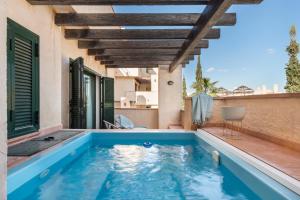 The swimming pool at or close to Casadeluxe Martinica 8 1 A