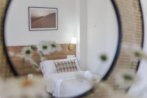Łóżko lub łóżka w pokoju w obiekcie El Oasis Martinica 8 1A