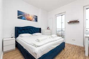 Posteľ alebo postele v izbe v ubytovaní Kasprzaka 29 B-C by Homeprime