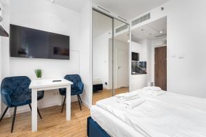 Posteľ alebo postele v izbe v ubytovaní Kasprzaka 29 B-C by Homeprime