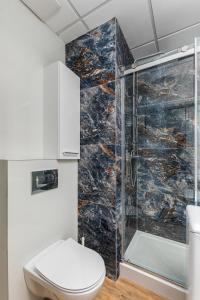 Kúpeľňa v ubytovaní Kasprzaka 29 B-C by Homeprime + 22 fotografií